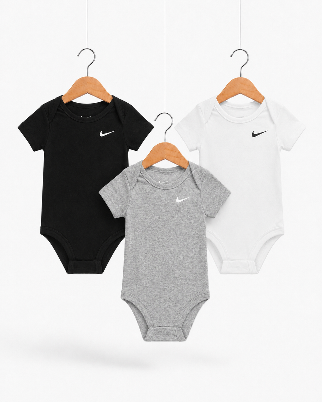 Set 3x Mameluco Nike, vario color, Negro, Gris, Blanco de 6 a 9 Meses